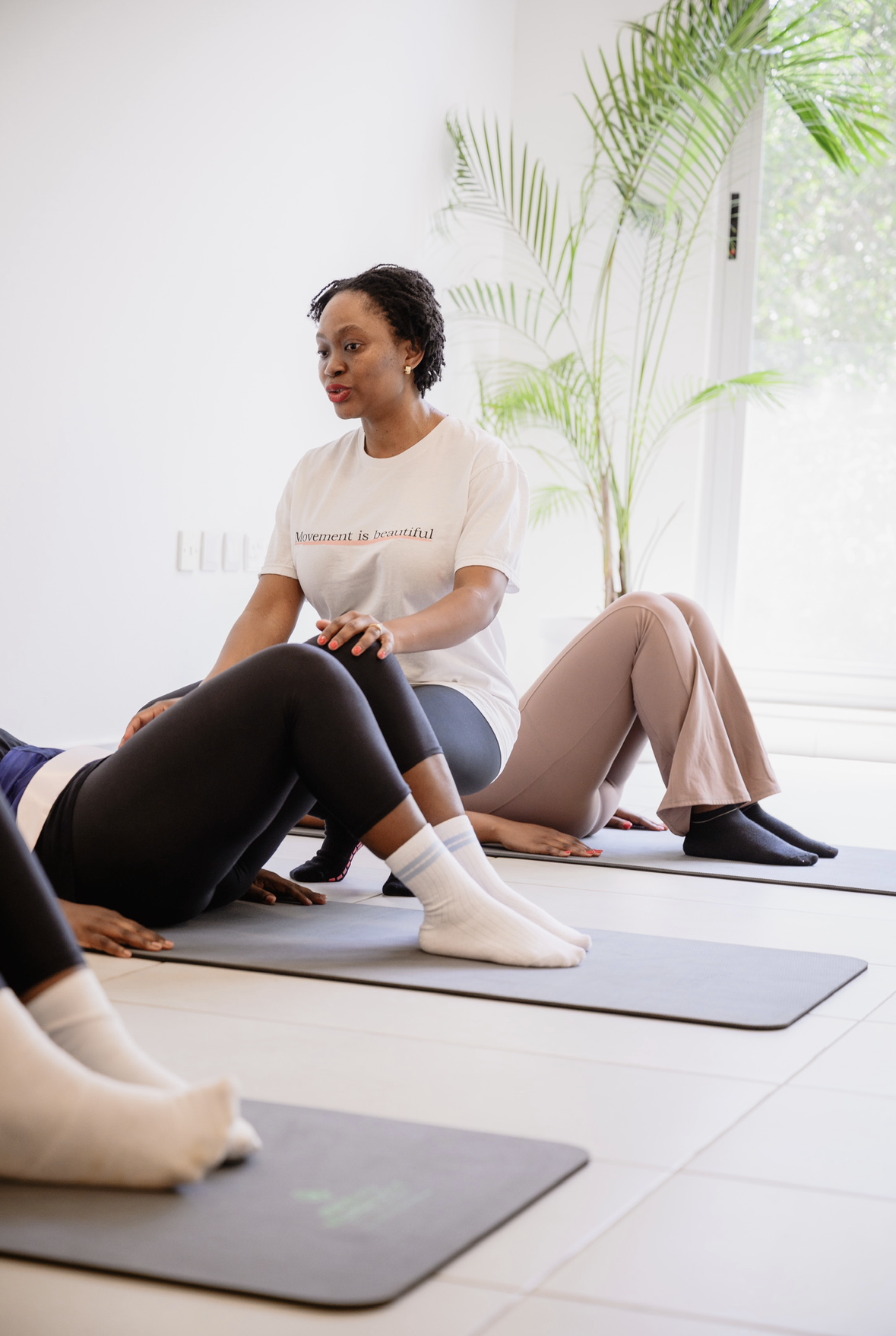 Joyce Mwape leading a Pilates class at Viva Core in Northampton